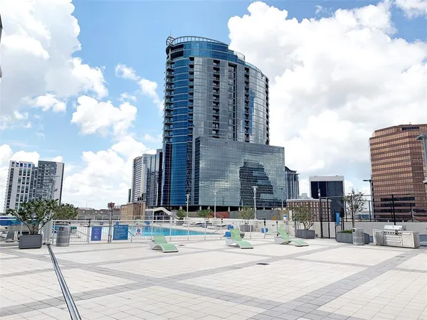 a view of swimming pool from a balcony