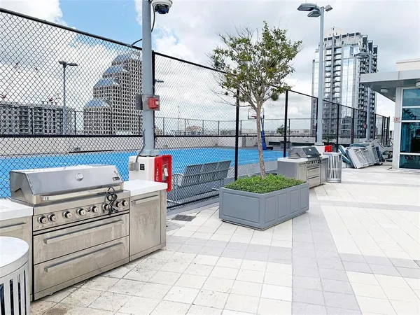 a lobby with furniture and floor to ceiling window