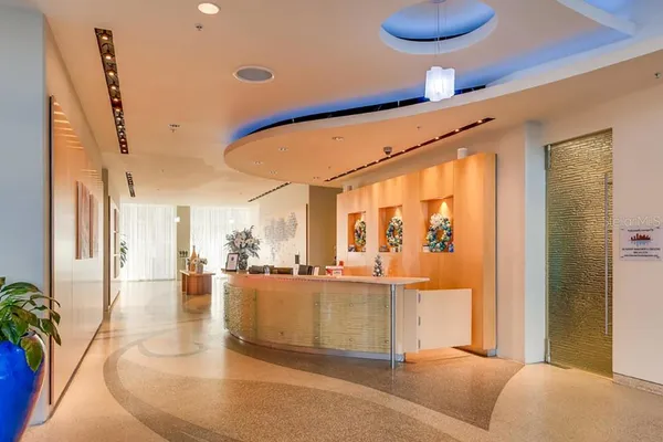 a bathroom with a tub and a shower