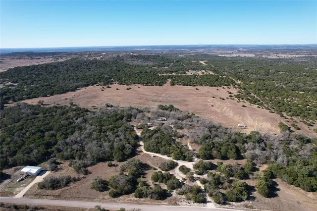 a view of a city with mountains in the background
