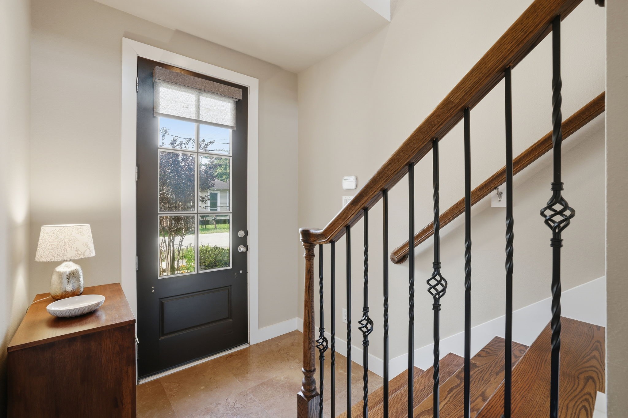 4102 Marina Street Houston, TX 77007 - Photo 31 of 32 Step inside to a wide-open floor plan where natural light pours through expansive windows. It’s the perfect setup for hosting friends or enjoying a quiet evening at home.