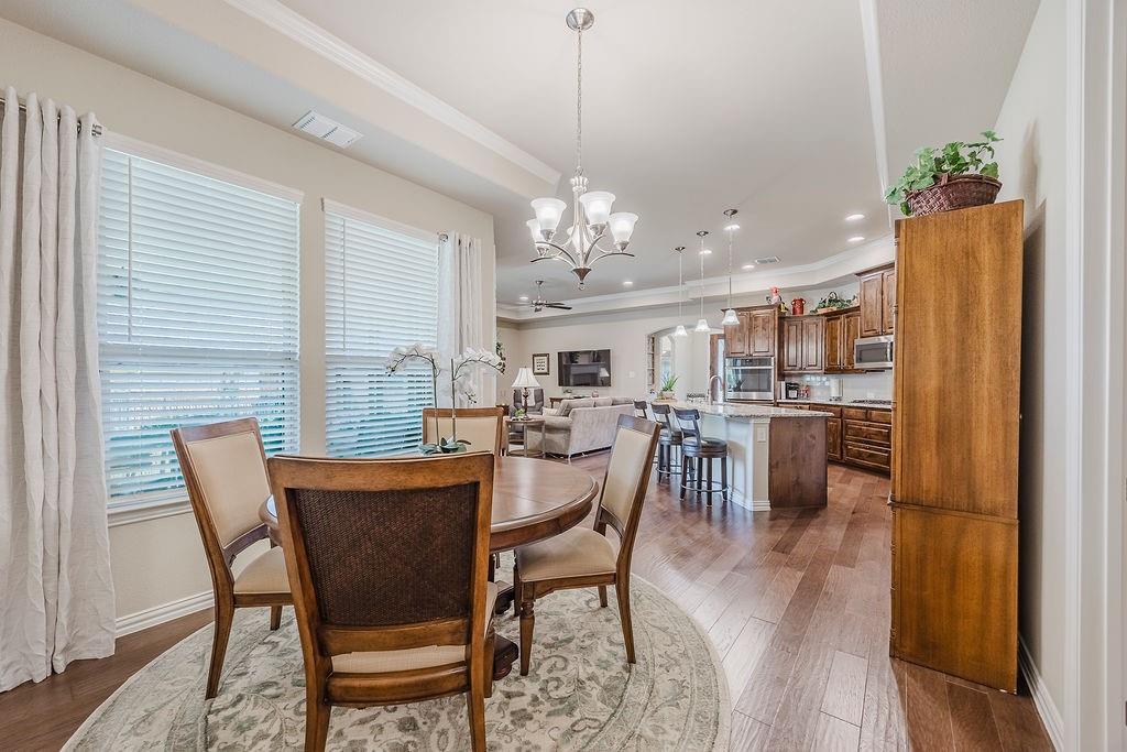 2123 Ladera Way, Unit 2123 Mansfield, TX 76063 - Photo 17 of 34 a dining room with furniture and window