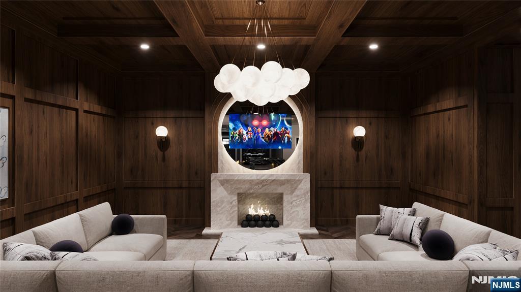 60 Rio Vista Drive Alpine, NJ 07620 - Photo 27 of 36 a living room with furniture a fireplace and a chandelier