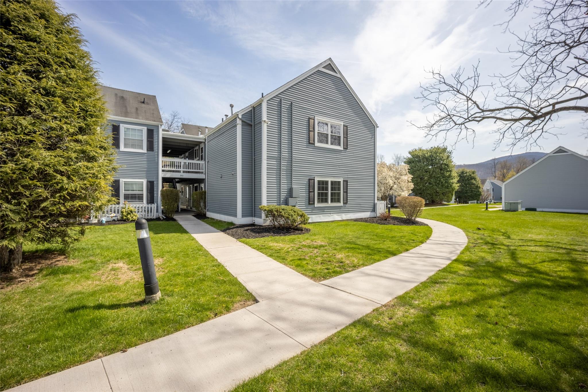 901 Commons Way, Unit F Fishkill, NY 12524 - Photo 1 of 1 View of front of property featuring a front yard
