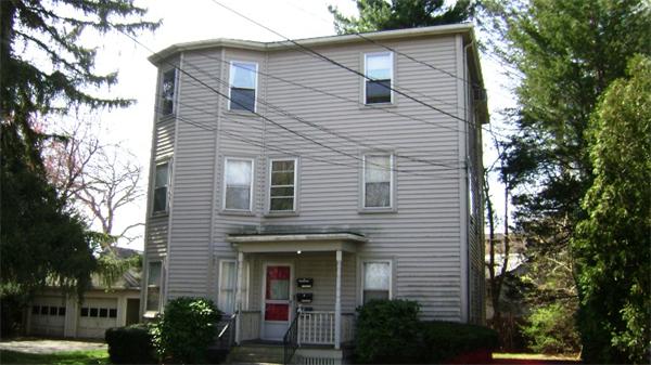 23 Riverside Street Needham, MA 02494 - Photo 1 of 12 a view of house with a window and potted plants