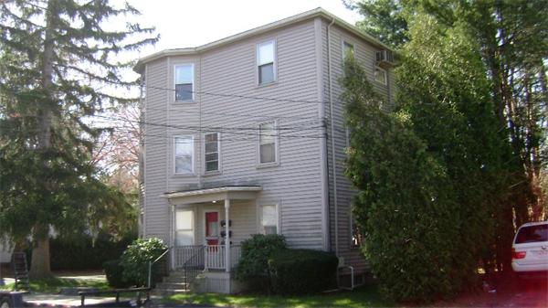 23 Riverside Street Needham, MA 02494 - Photo 3 of 12 a front view of a house with plants and trees
