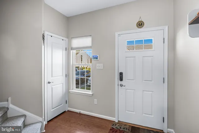 a view of a two chairs in the patio