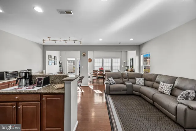 a living room with furniture and a couch