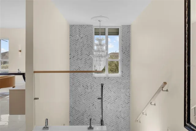 a living room with furniture and windows