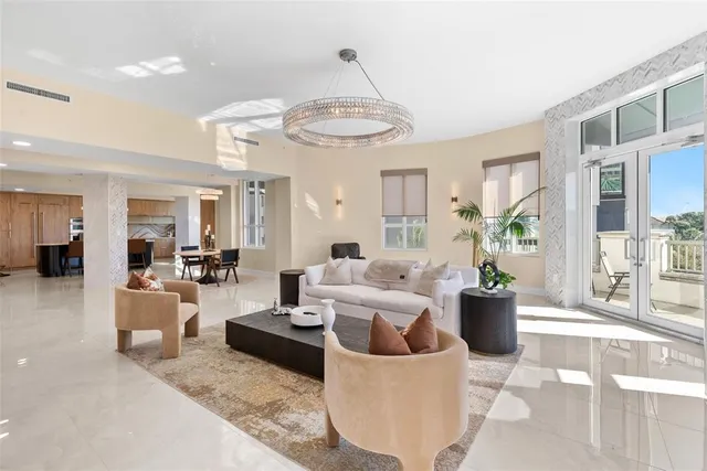 a kitchen with stainless steel appliances a refrigerator and cabinets