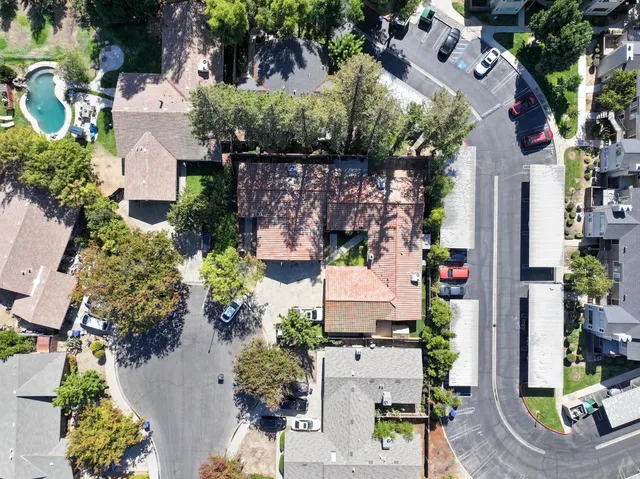an aerial view of a houses with outdoor space