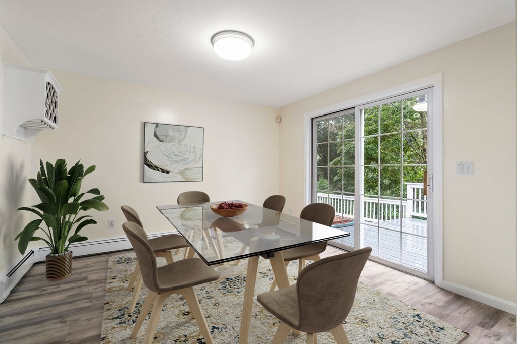 98 Allen Street Walpole, MA 02081 - Photo 11 of 37 a dining room with furniture and wooden floor