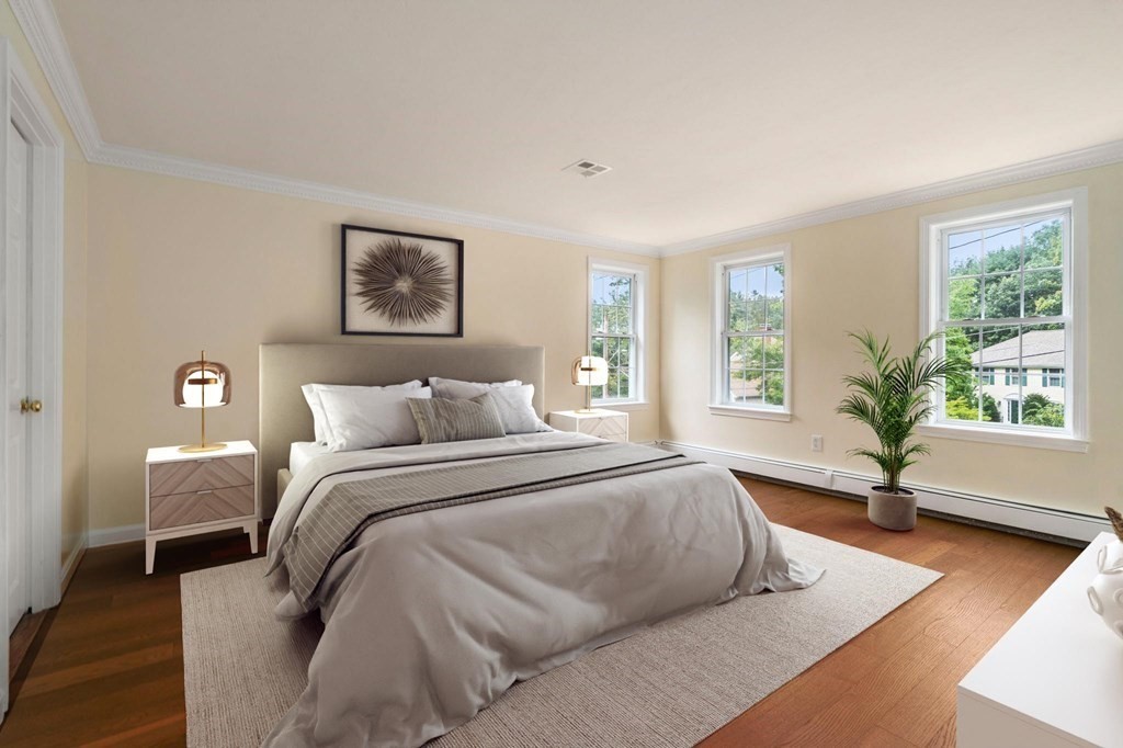 98 Allen Street Walpole, MA 02081 - Photo 19 of 37 a living room with a bed furniture and a window