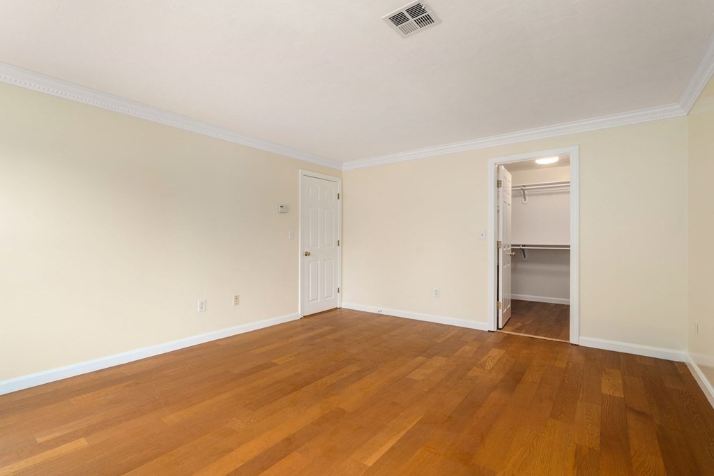 98 Allen Street Walpole, MA 02081 - Photo 21 of 37 a view of empty room with wooden floor