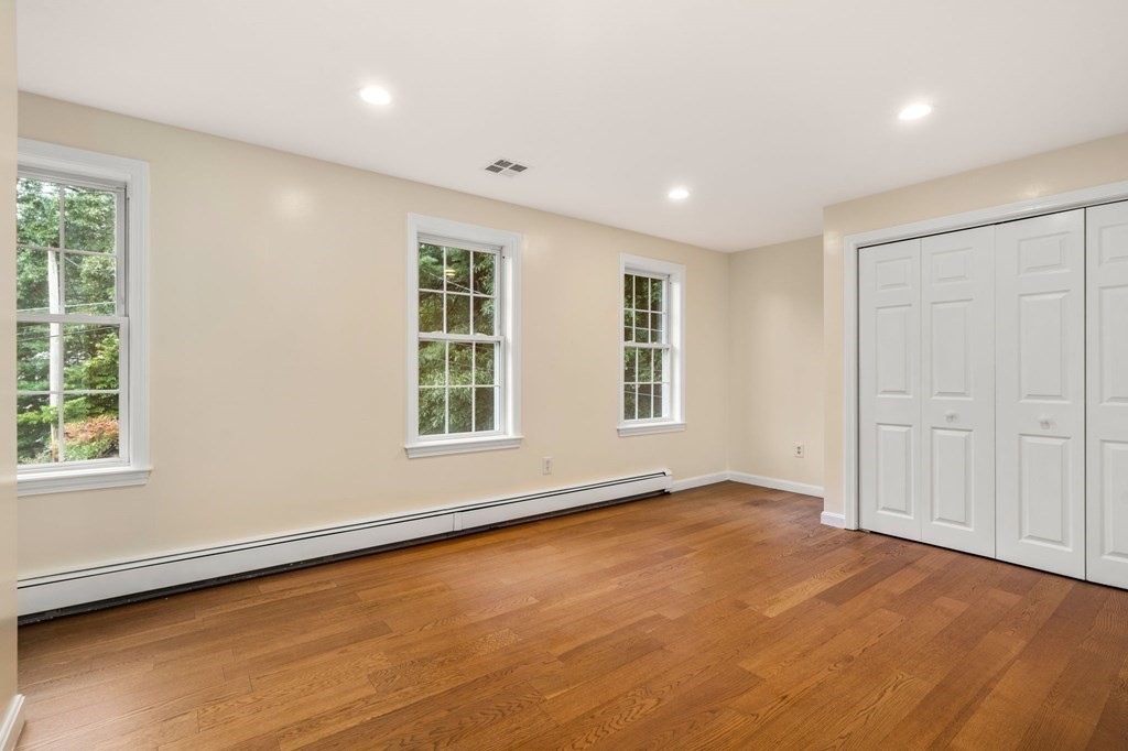 98 Allen Street Walpole, MA 02081 - Photo 24 of 37 an empty room with windows
