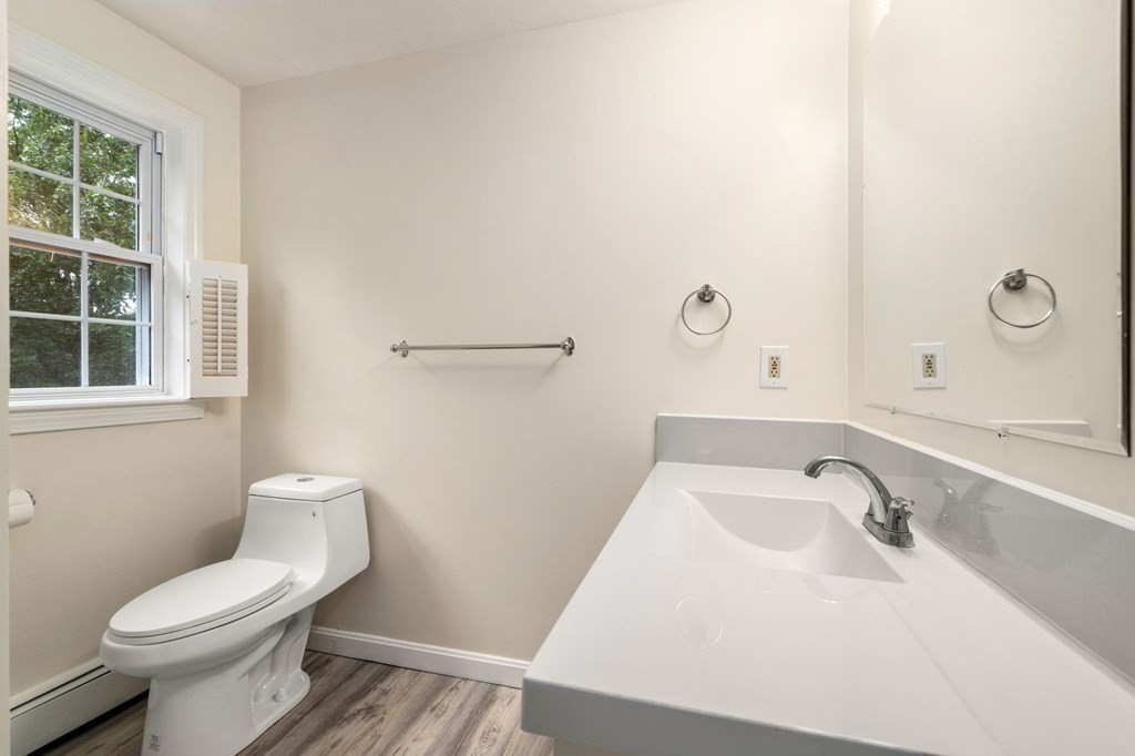 98 Allen Street Walpole, MA 02081 - Photo 28 of 37 a bathroom with a sink and toilet