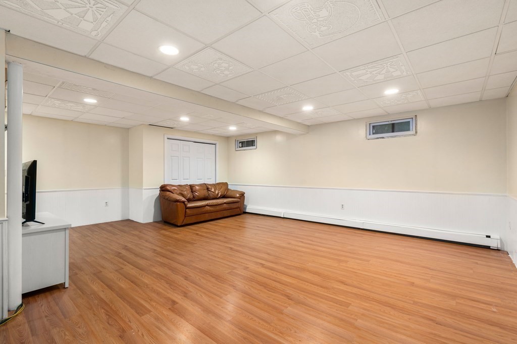 98 Allen Street Walpole, MA 02081 - Photo 30 of 37 a view of a room with wooden floor