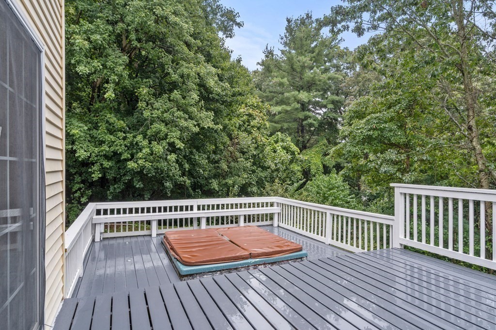 98 Allen Street Walpole, MA 02081 - Photo 34 of 37 a view of balcony with wooden floor and fence