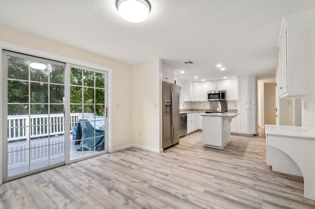 98 Allen Street Walpole, MA 02081 - Photo 10 of 37 a view of kitchen with wooden floor