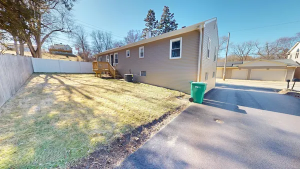 a house view with a backyard space