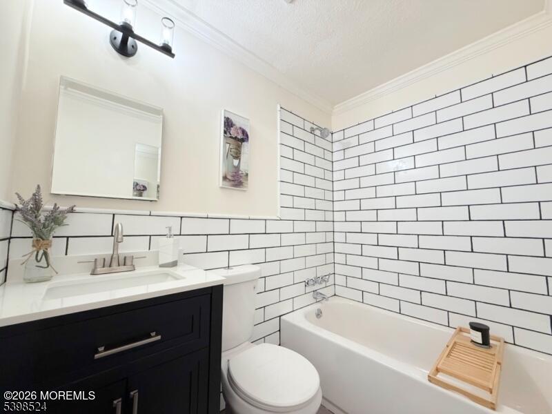 484 Bara Street Brick, NJ 08723 - Photo 11 of 15 a bathroom with a sink toilet and bathtub