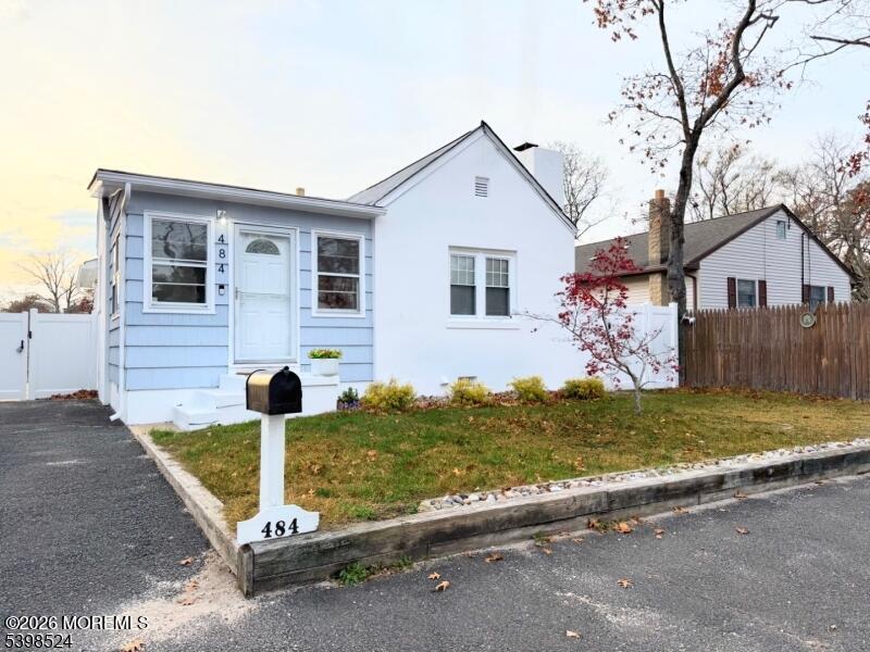 484 Bara Street Brick, NJ 08723 - Photo 2 of 15 a front view of a house with a yard