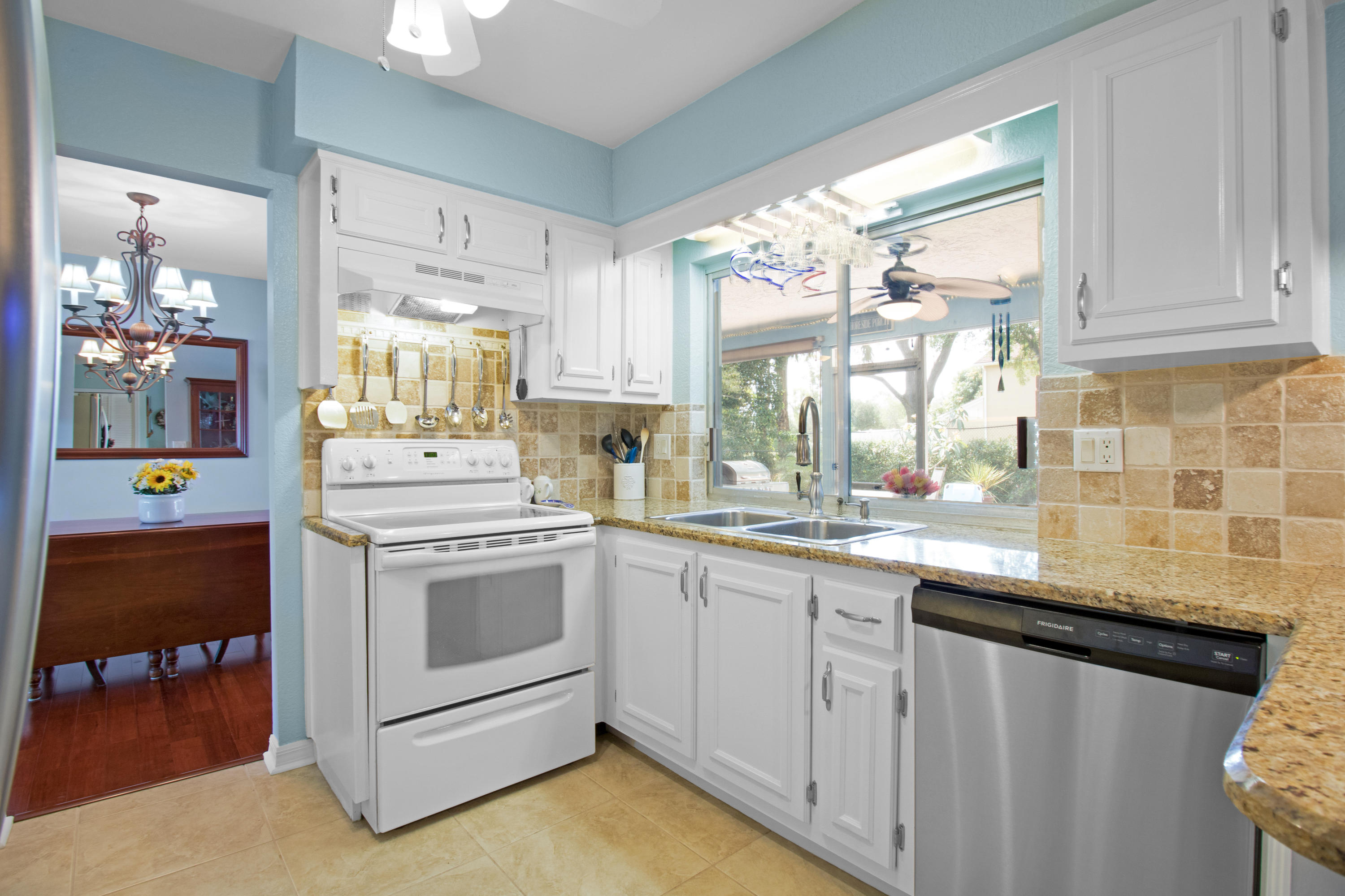 22576 Lanyard Street Boca Raton, FL 33428 - Photo 22 of 47 Kitchen has passthrough to patio