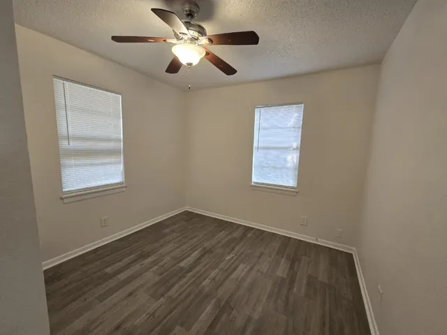 a kitchen with a sink stove and refrigerator