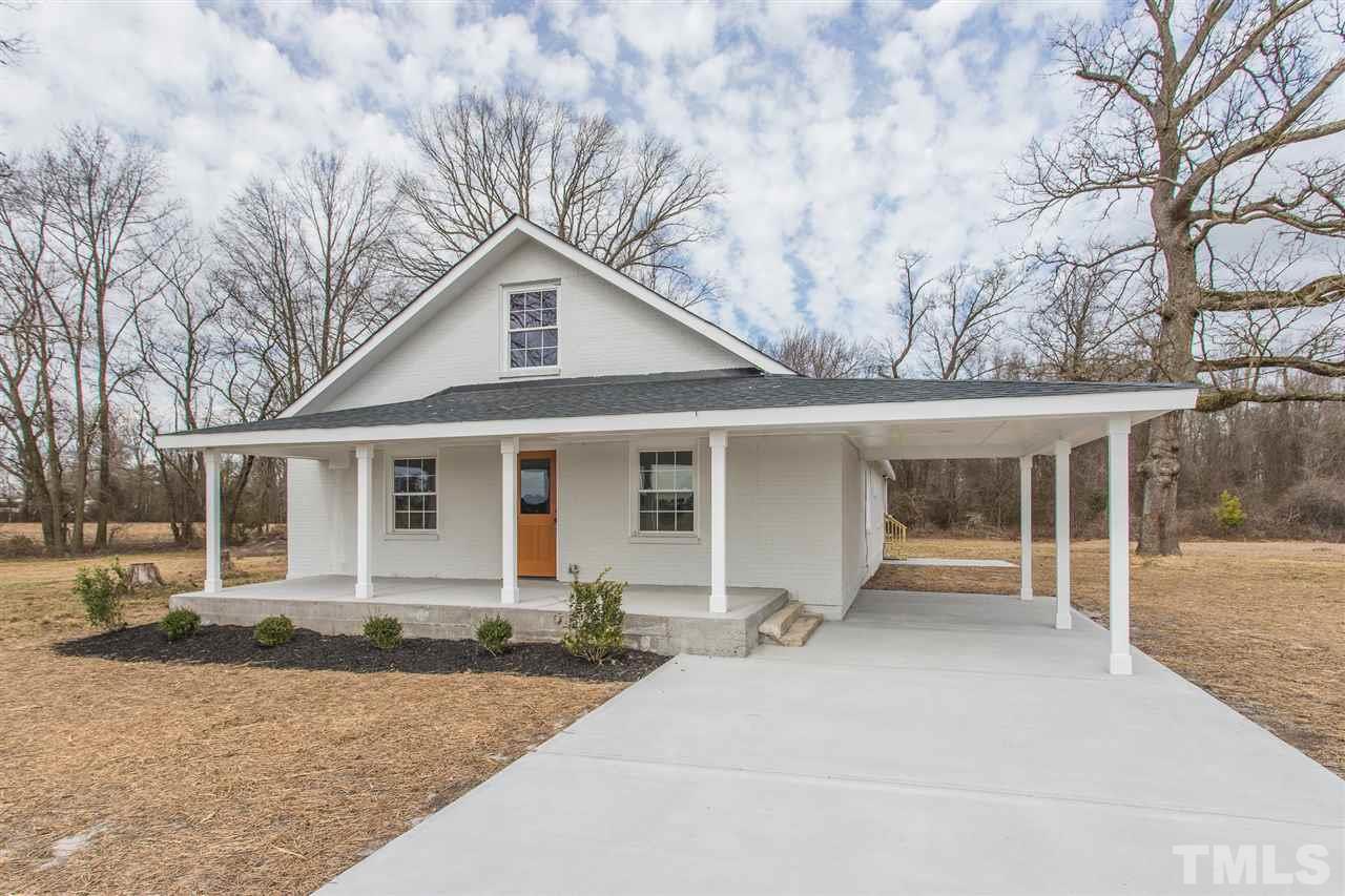 937 Wilson Road Clinton, NC 28328 - Photo 2 of 28 a front view of a house with yard and trees