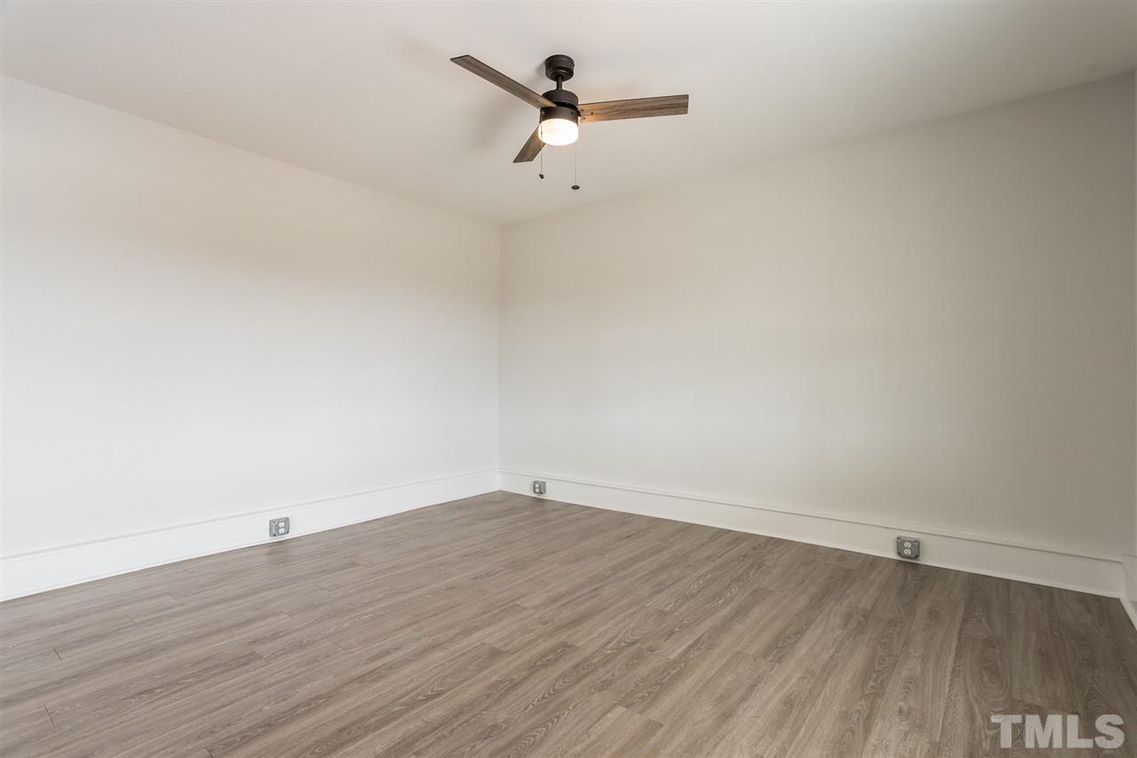 937 Wilson Road Clinton, NC 28328 - Photo 11 of 28 wooden floor in an empty room