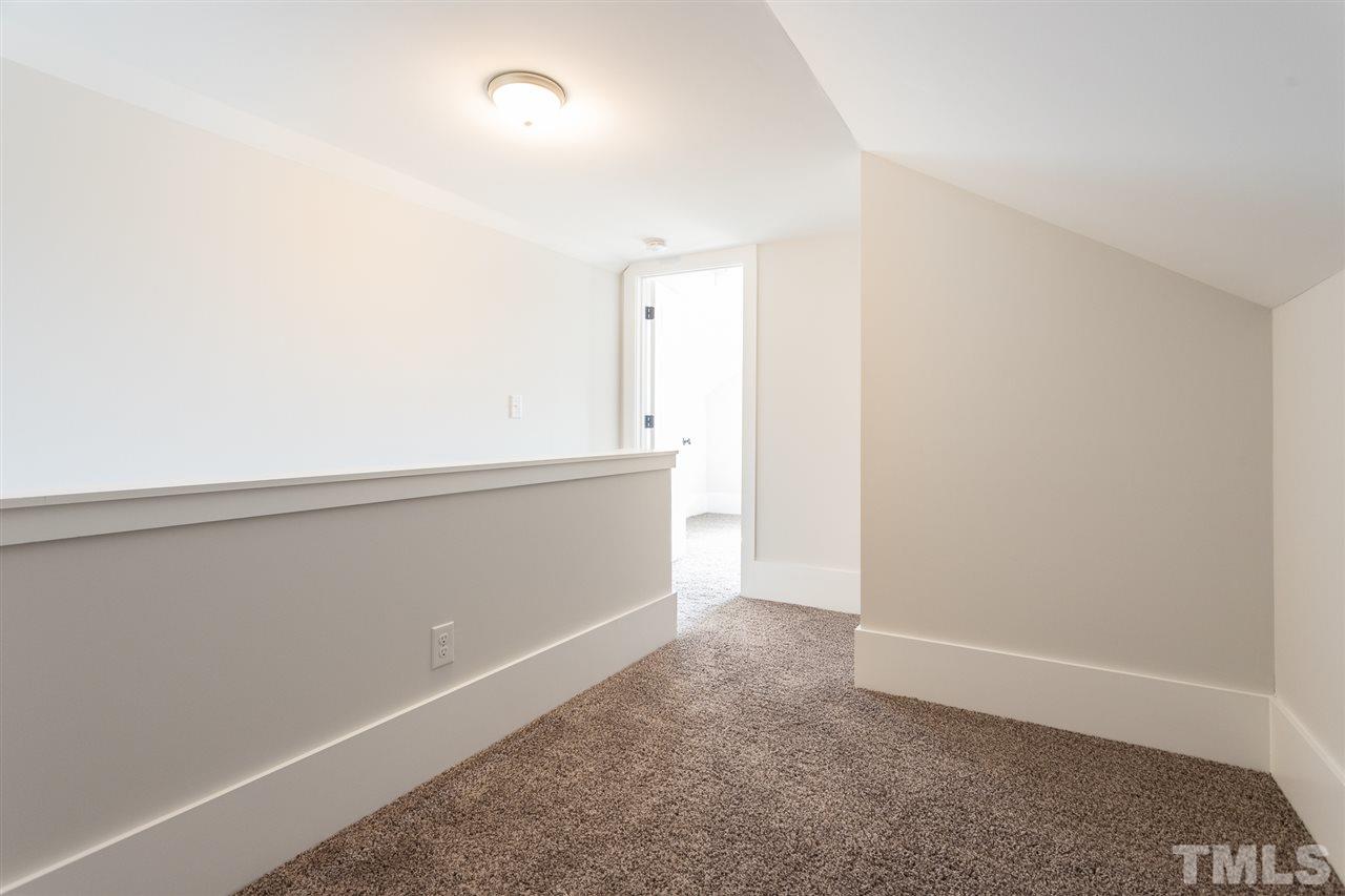 937 Wilson Road Clinton, NC 28328 - Photo 26 of 28 an empty room with a workbench