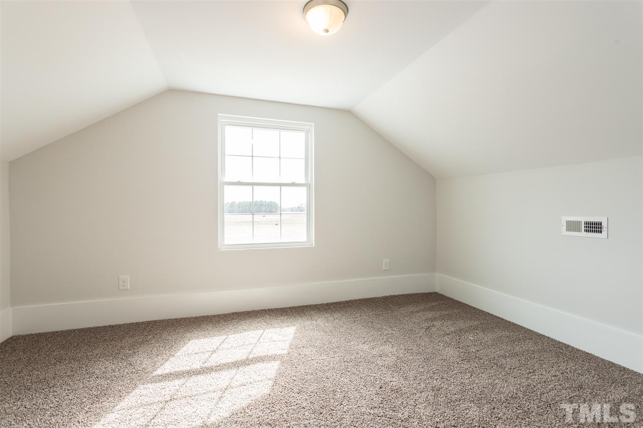 937 Wilson Road Clinton, NC 28328 - Photo 27 of 28 an empty room with a window