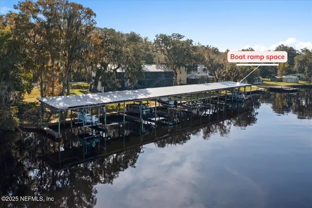 a view of a chairs and table in a patio