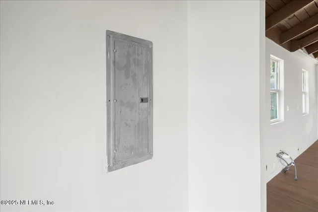 a view of a swimming pool with a lounge chair