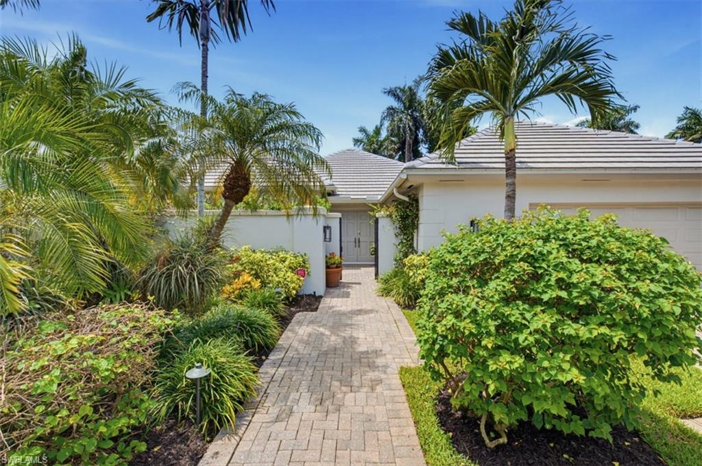 512 Turtle Hatch Road Naples, FL 34103 - Photo 3 of 18 Entry into a Private Courtyard