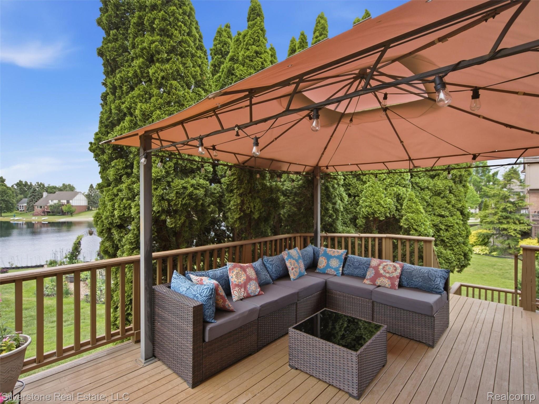 6577 Edith Court Troy, MI 48085 - Photo 50 of 61 Expansive outdoor deck featuring wood-finish flooring and a full railing system