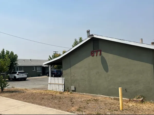 a car parked in front of a house