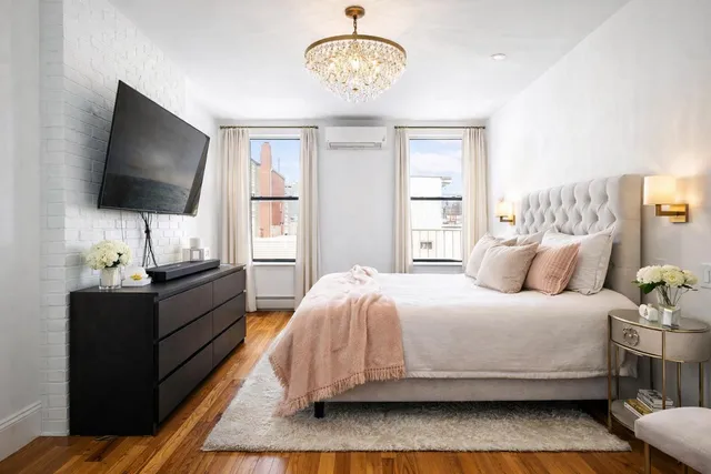 a kitchen with stainless steel appliances a refrigerator and a stove