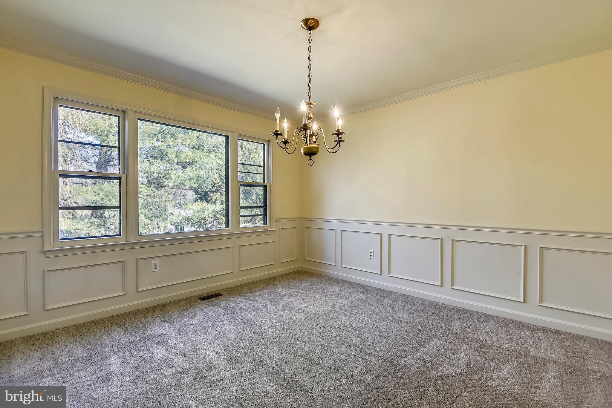 109 Farmgate Lane Silver Spring, MD 20905 - Photo 18 of 50 Dining room with wainscoting and picture window
