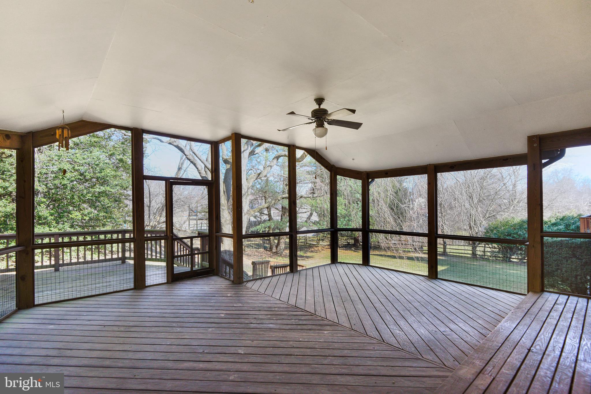 109 Farmgate Lane Silver Spring, MD 20905 - Photo 3 of 50 Rear screened in deck and porch