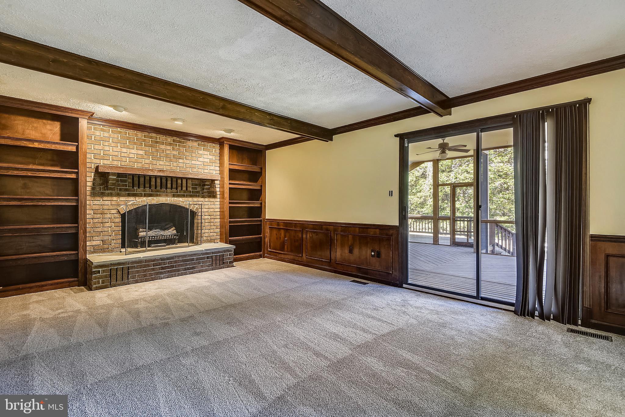109 Farmgate Lane Silver Spring, MD 20905 - Photo 9 of 50 Family room w/ custom built-ins + brick fireplace