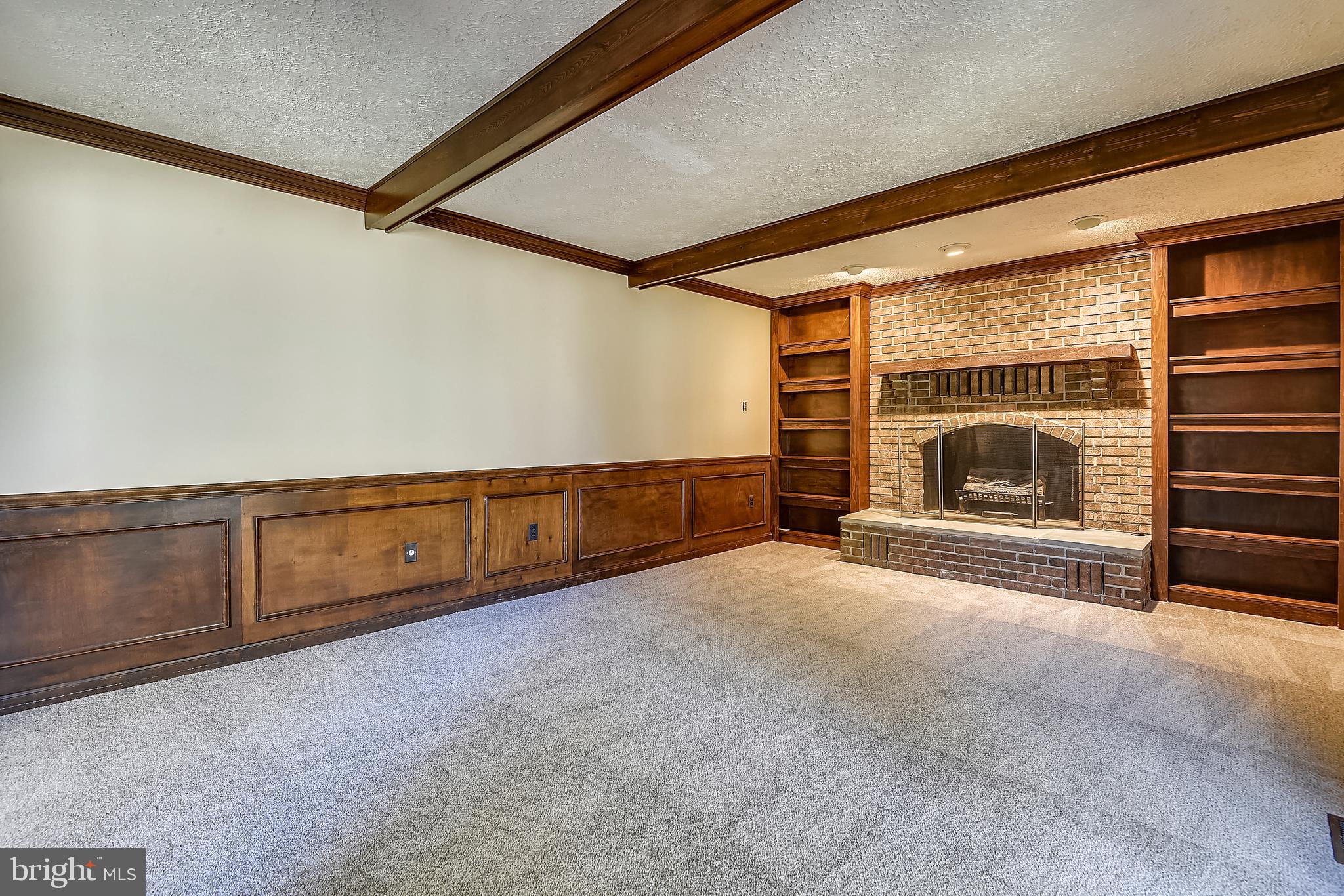 109 Farmgate Lane Silver Spring, MD 20905 - Photo 10 of 50 Family room with wainscoting + beamed ceiling