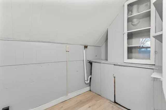 a view of a room with rack on the wall