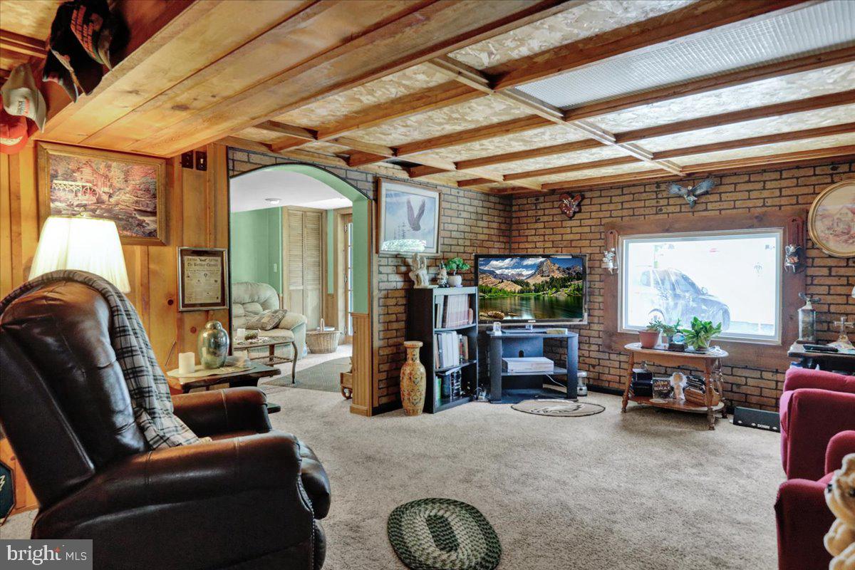 1717 Friedensburg Road Reading, PA 19606 - Photo 12 of 63 a living room with furniture and a fireplace