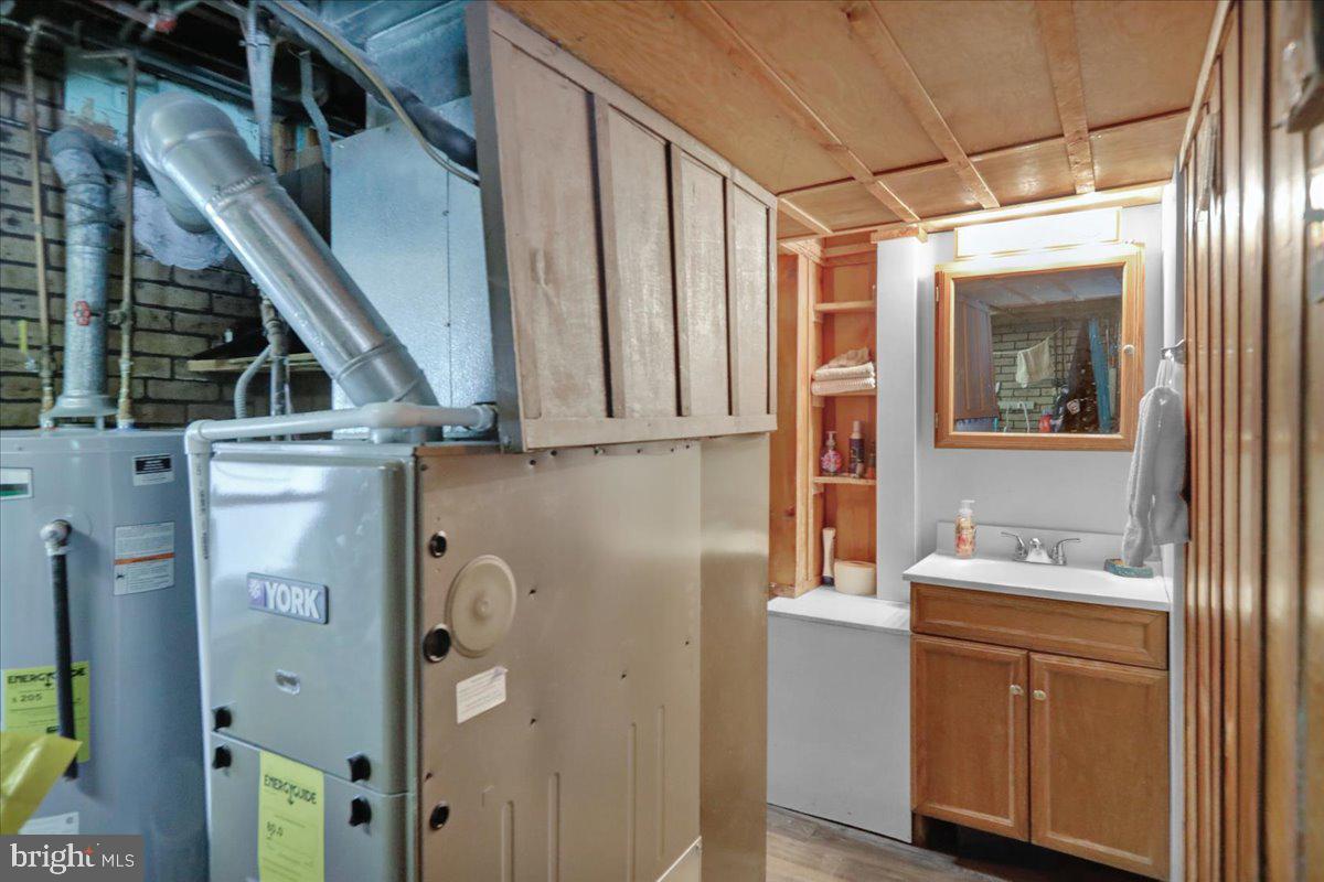 1717 Friedensburg Road Reading, PA 19606 - Photo 13 of 63 a bathroom with a sink and a mirror