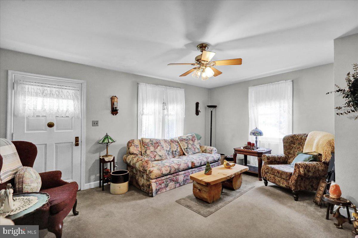 1717 Friedensburg Road Reading, PA 19606 - Photo 17 of 63 a living room with furniture and a large window