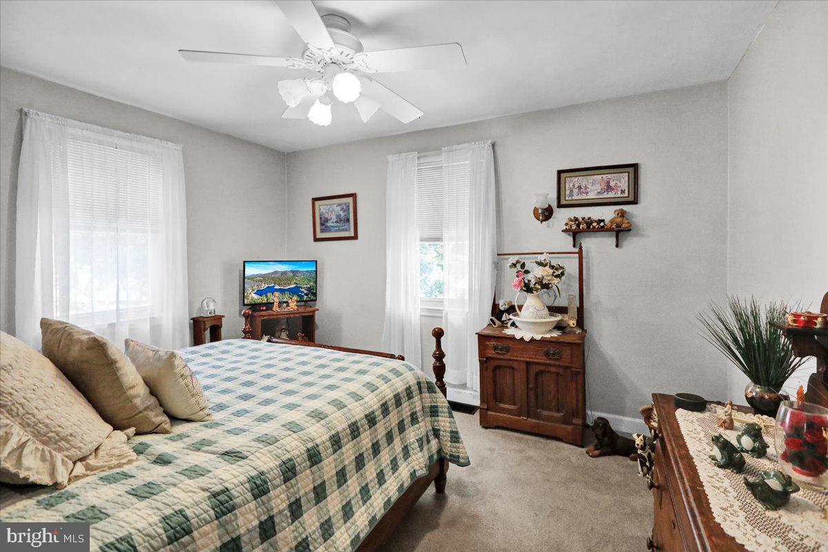 1717 Friedensburg Road Reading, PA 19606 - Photo 18 of 63 a bedroom with a bed and furniture