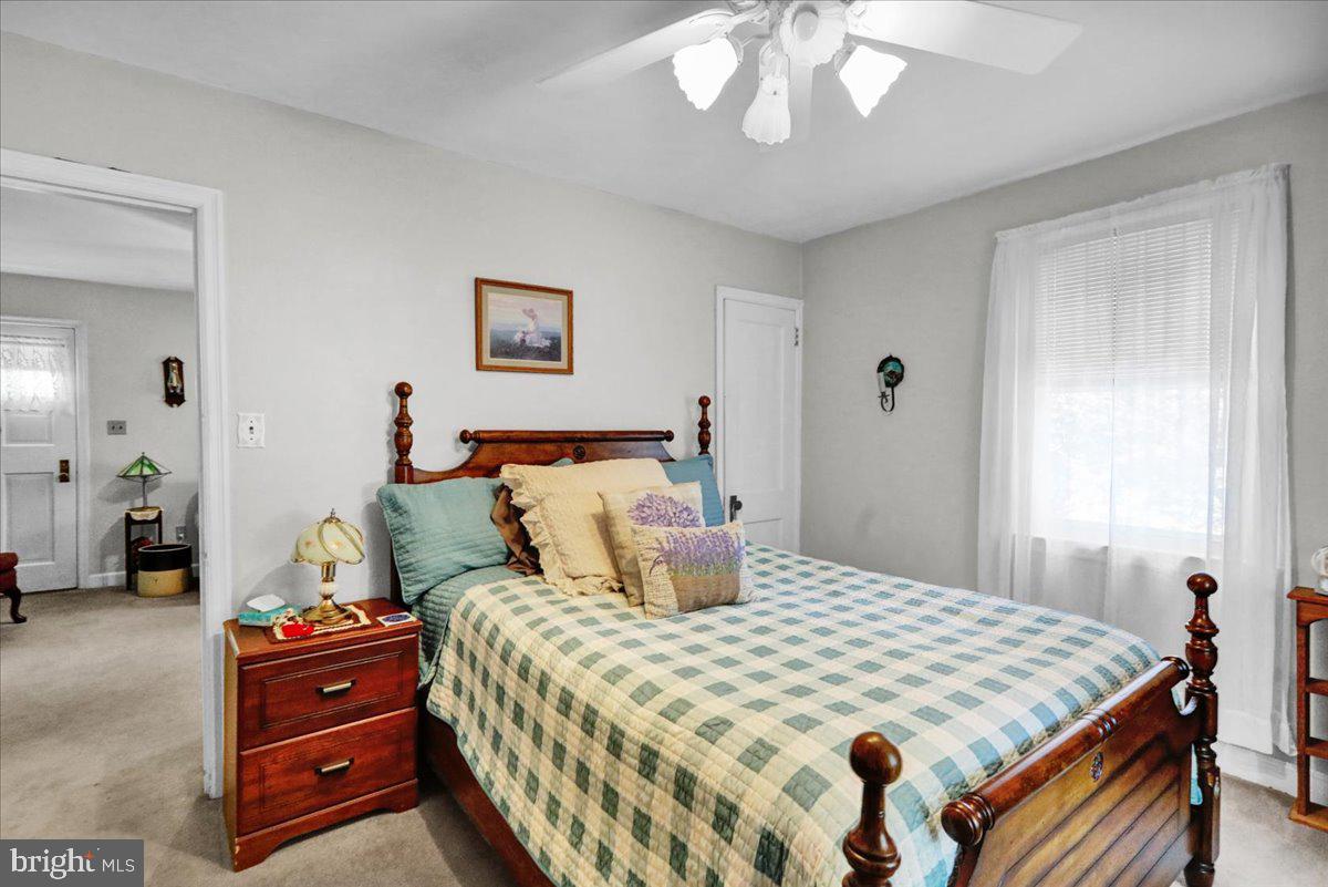 1717 Friedensburg Road Reading, PA 19606 - Photo 19 of 63 a bedroom with a bed and wooden floor