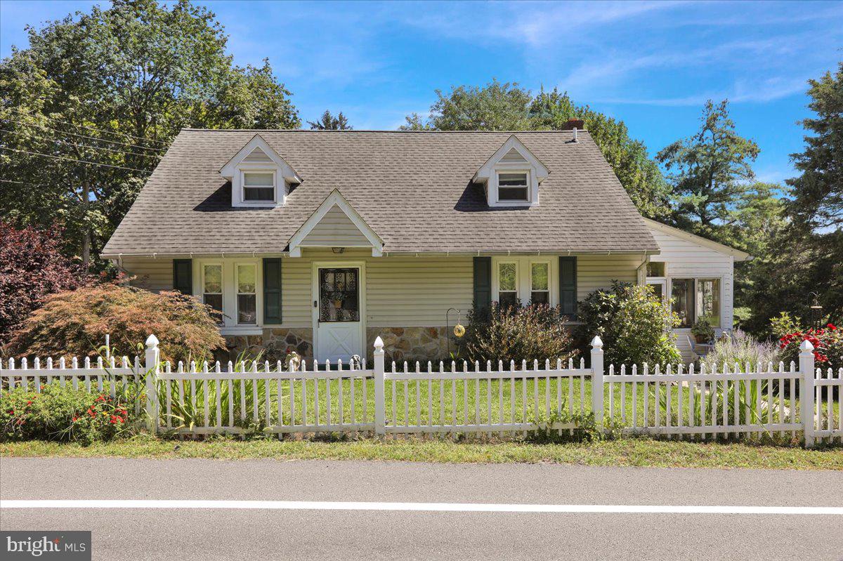 1717 Friedensburg Road Reading, PA 19606 - Photo 2 of 63 a front view of a house with a small yard