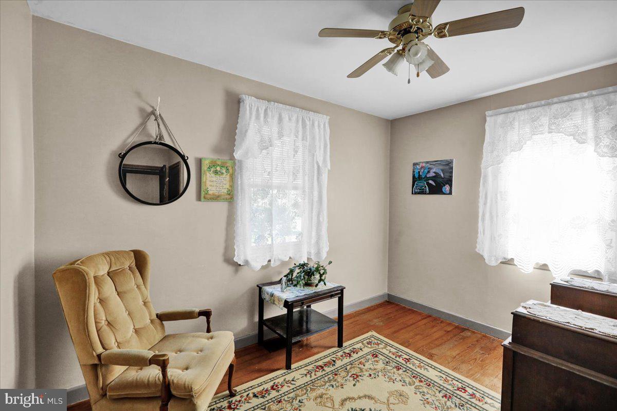 1717 Friedensburg Road Reading, PA 19606 - Photo 22 of 63 a living room with furniture and a window